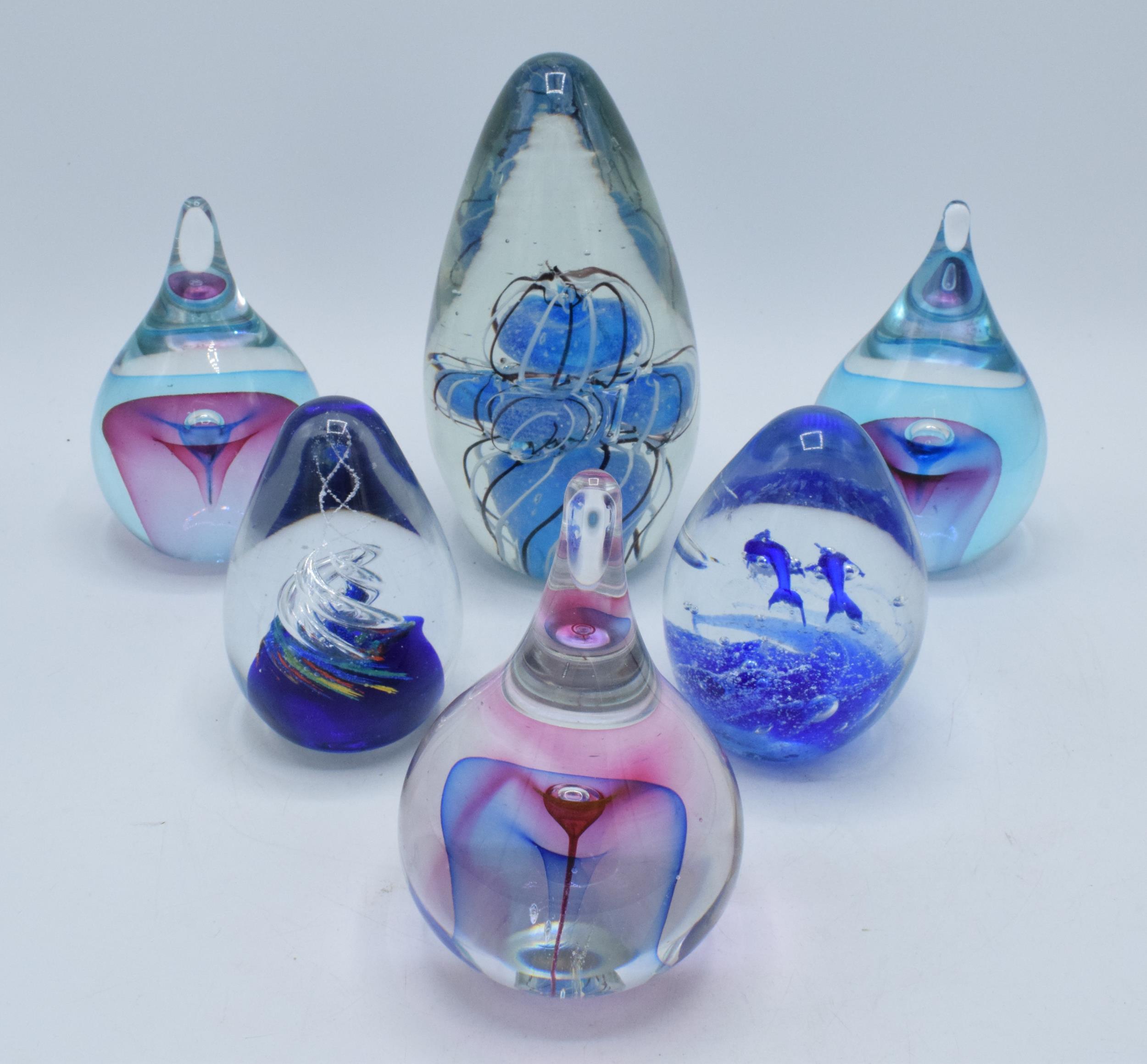 A collection of 6 heavy glass paperweights of varying forms and colours, tallest 18cm (6).