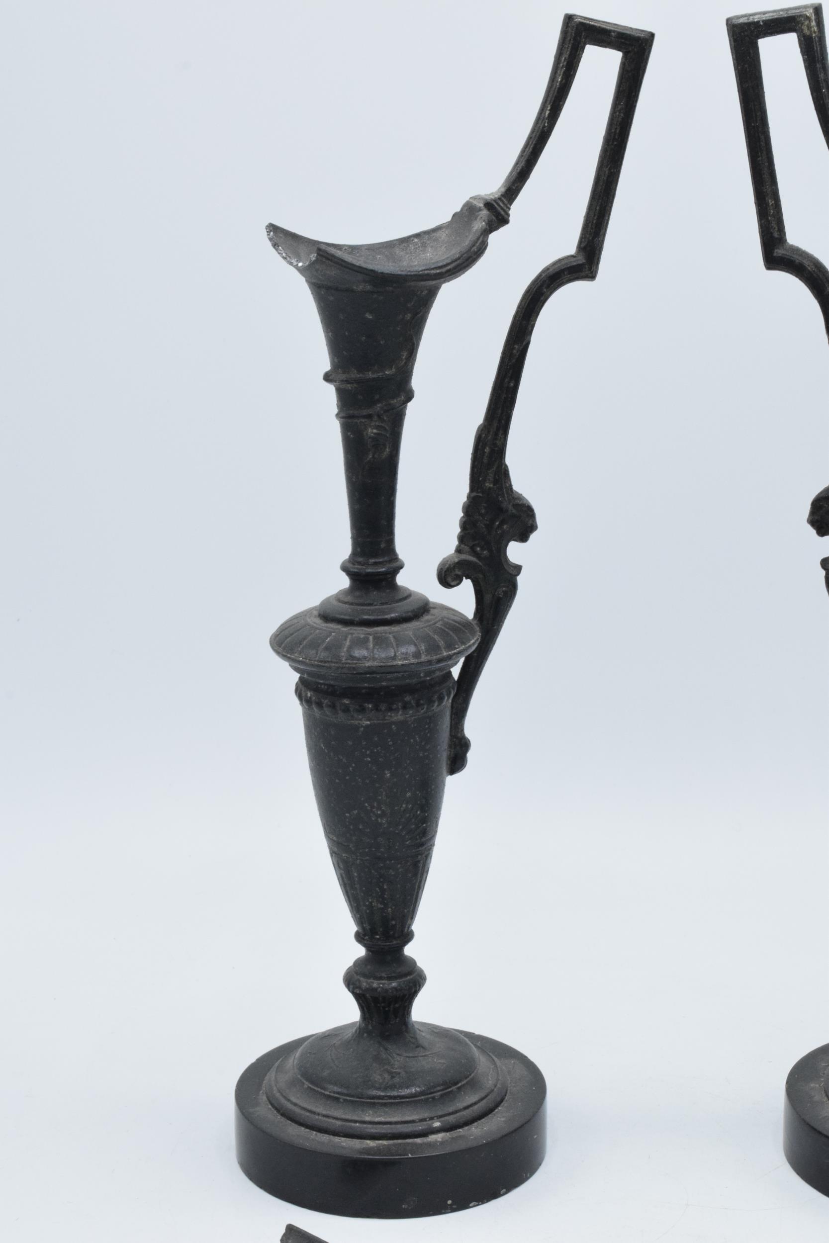 A pair of attractive spelter vases with figural handles on slate bases, damage to spout (2), 31cm - Image 3 of 5
