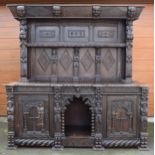 Large 19th century oak dresser with heavily carved decoration in the 17th century Carolean style
