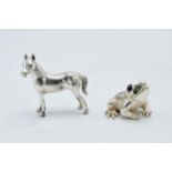 A pair of sterling silver miniature animal models to include a horse facing left and a frog with