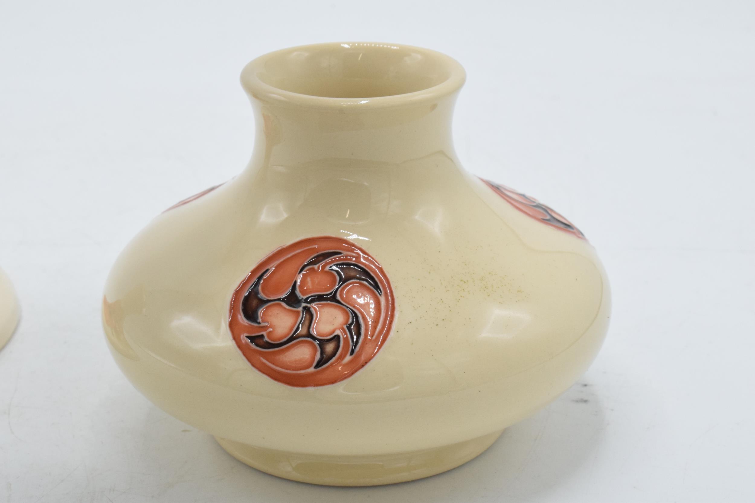 Moorcroft squat vase decorated with a Florian vase (red dot) together with Hibiscus candlestick (2). - Image 3 of 6