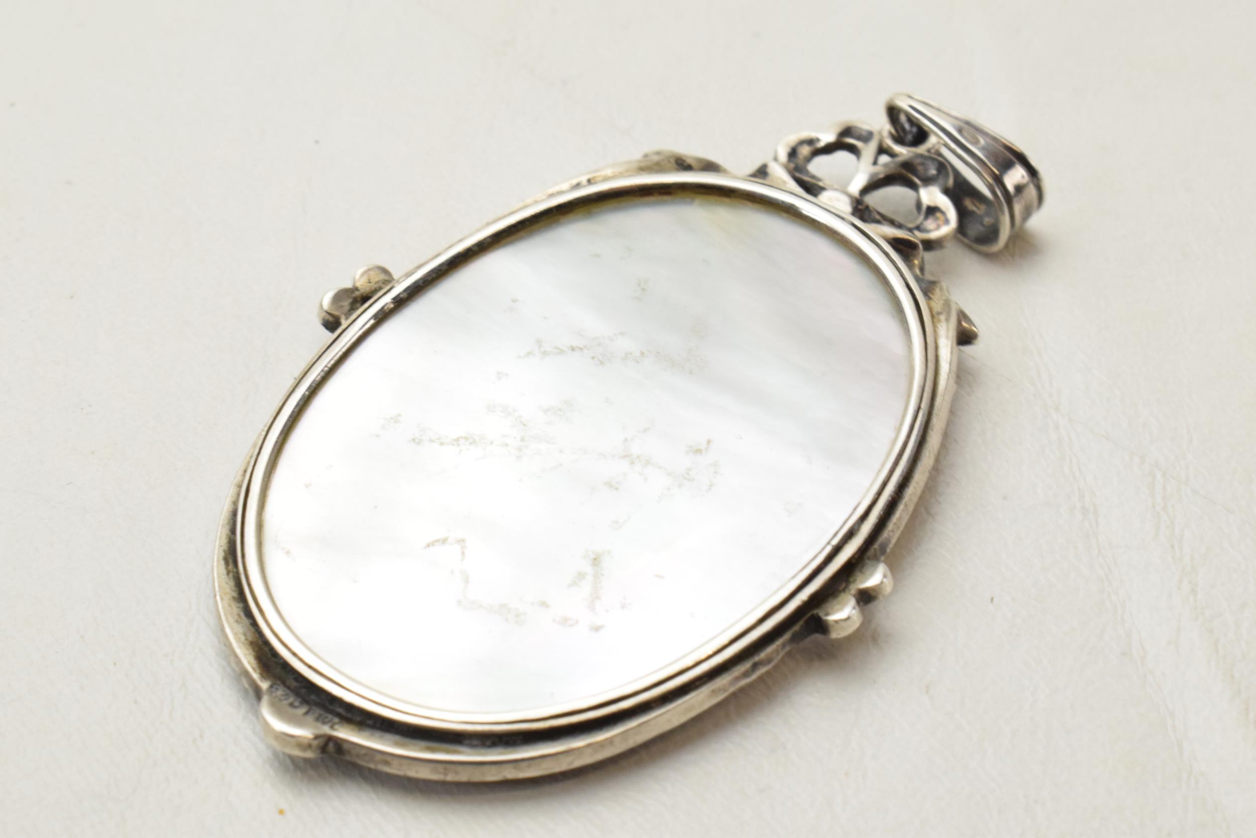 Silver and marcasite mother of pearl miniature pendant with portrait of a lady, 6cm long. - Image 3 of 3