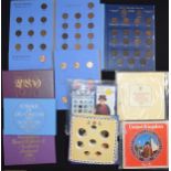 A collection of coin sets to include Whitman folders, Coinage of Great Britain and other coin