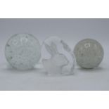 A trio of glass paperweights to include a rabbit example and 2 bubble effect items (3). In good