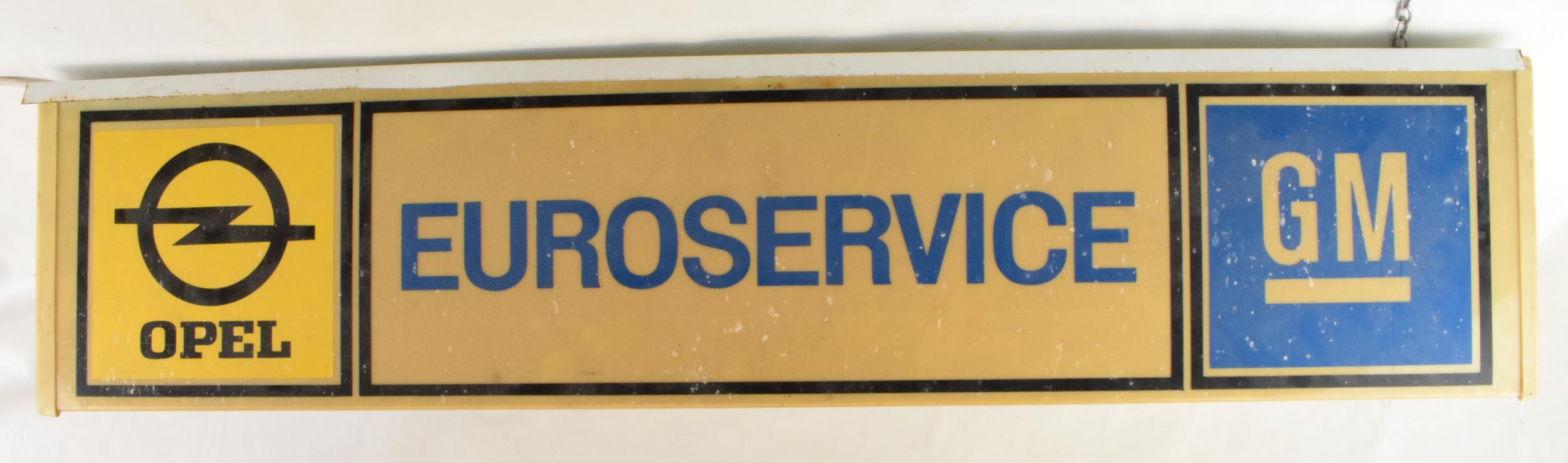 An original vintage double-sided Opel EUROSERVICE GM General Motors Lightbox salvaged from a car