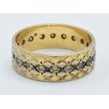 18ct gold eternity ring, 4.1 grams, size L (some stones missing).