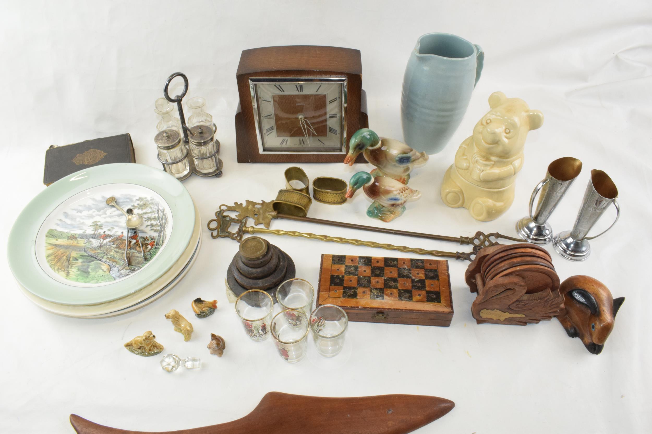 A mixed collection of items to include vintage clock (working) ceramic item, wade whimsies and