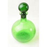 Green glass onion shaped 13.5cm bottle with stopper. Some minor chipping on the bottom of the