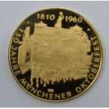 150 Jahre .900 gold coin / medal 'Munchener Oktoberfest 1810-1960, 20mm diameter, 3.5 grams.