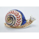 Royal Crown Derby paperweight, Snail, decorated in the classic spiral design/shell pattern and