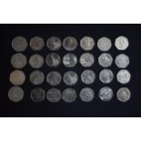 A collection of UK 50 pence pieces to include Beatrix Potter coins, other collectable series and old