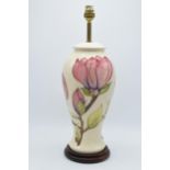 Large Moorcroft lamp base with pink floral pattern on a magnolia background, 35cm tall exc. brass