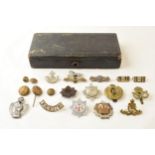 A good collection of Military Cap badges together with a WWII era RAC (Royal Automobile Club) cap