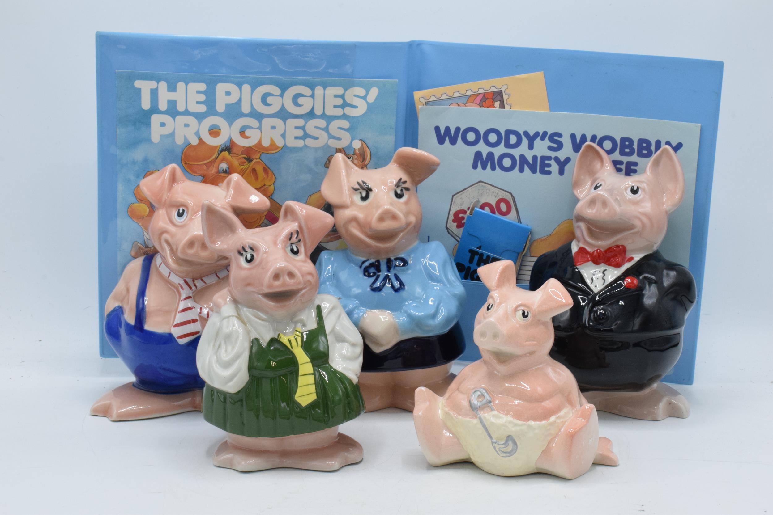 Wade Natwest Pig Family to include a folder with related items (6). In good condition with no