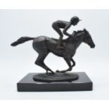 A bronze statue of "Champion Finish"showing Lester Piggott on Nijinsky modelled by David Cornell