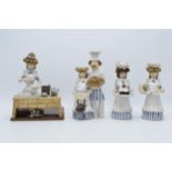 A collection of Laura Dunn ceramic cooking figures to include a girl mixing, a couple with bread and