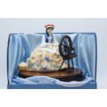 Boxed Royal Doulton 'The Gentle Arts' figurine 'Spinning', HN2390, 158/750, with certificate. In