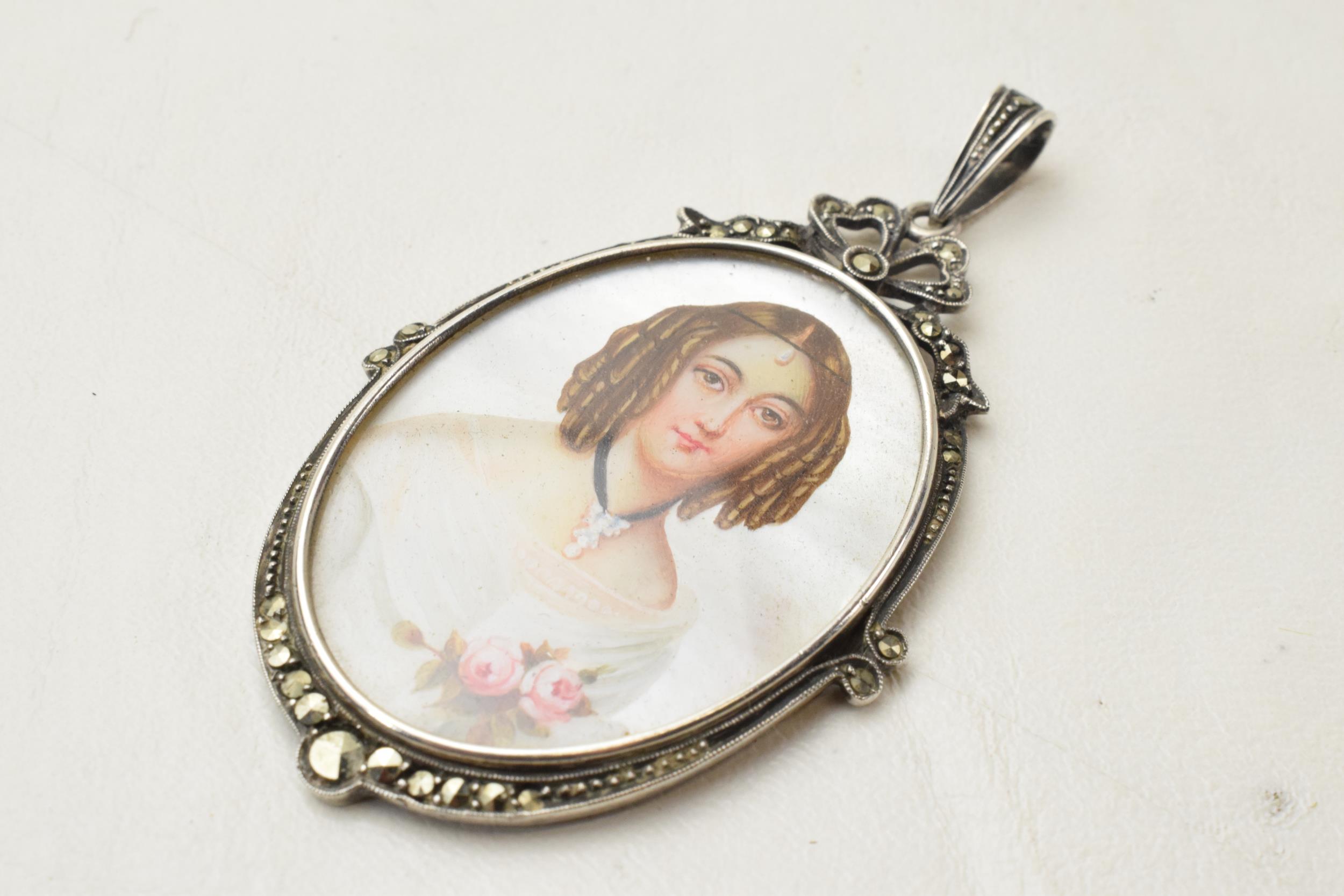 Silver and marcasite mother of pearl miniature pendant with portrait of a lady, 6cm long. - Image 2 of 3