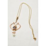 9ct rose gold garnet and pearl Art Nouveau pendant on 9ct gold chain, 3.2 grams.