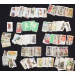 A collection of vintage cigarette cards to include Wills's Association Footballers, Wills's Speed,