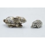 A pair of silver miniature figures of a hedgehog and a rabbit, combined weight 26 grams (2), tallest