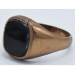 9ct rose gold gentleman's signet ring set with onyx, 5.0 grams, size W.