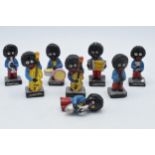 A collection of Robertsons advertising band figures to include a trumpet player, double bass and