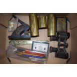 A collection of items to include brass trench art, figural book mark, unmarked pair of binoculars,