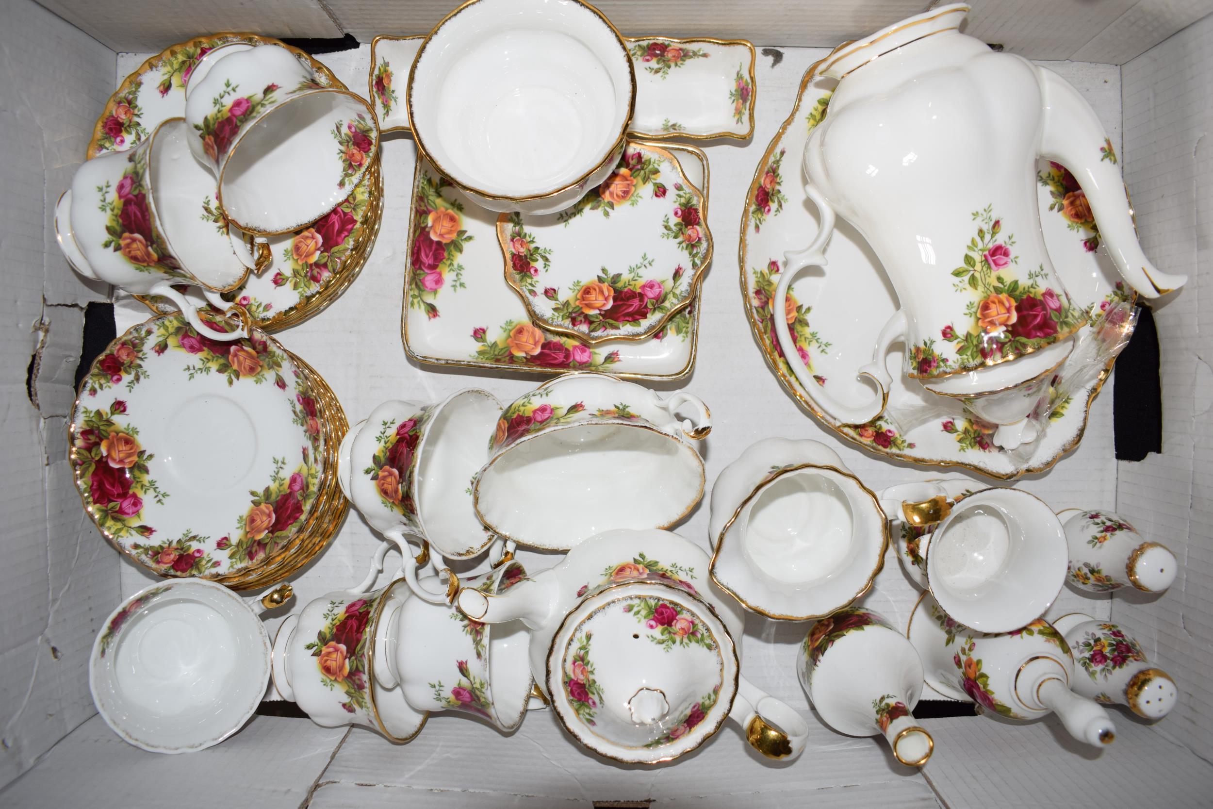 Royal Albert Old Country Roses to include a small teapot, a coffee pot, cups, saucers, side plates