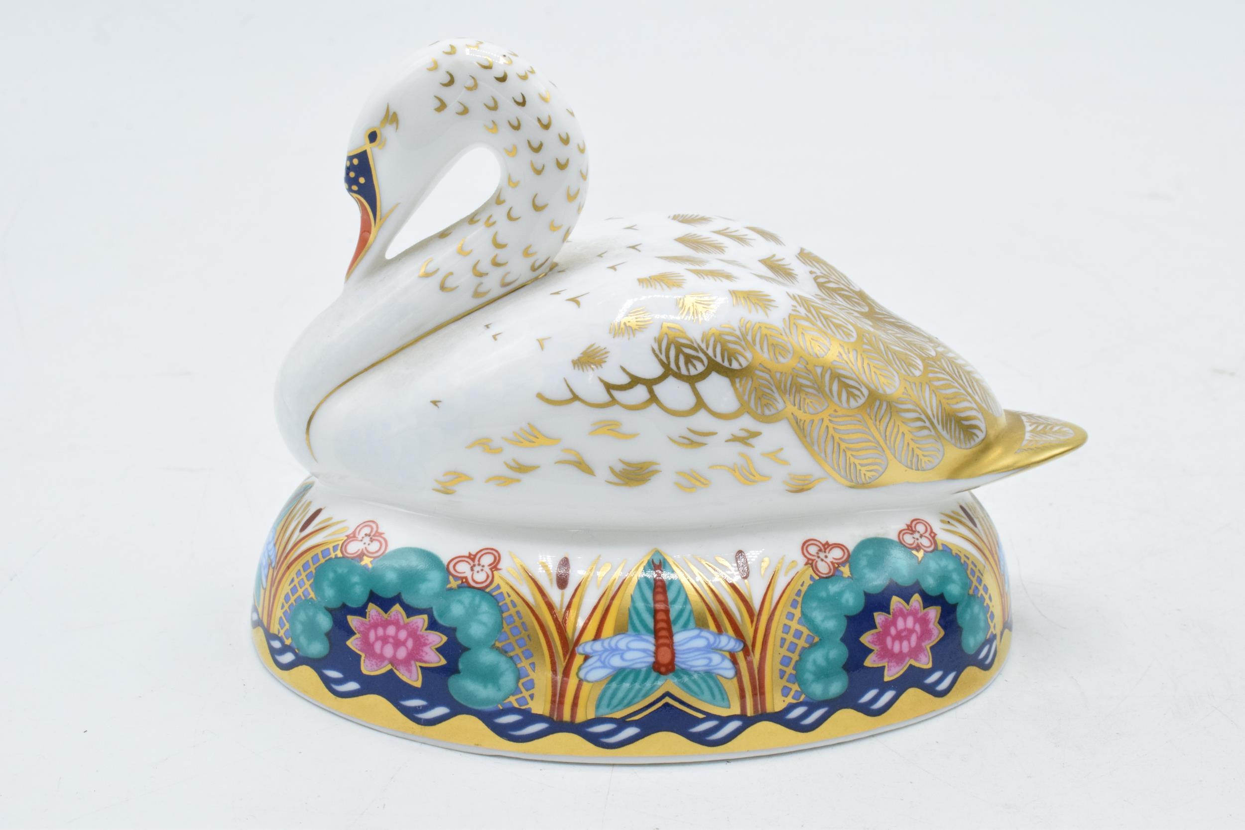 Royal Crown Derby Paperweight, White Swan nesting, date mark for 1997, gold stopper and red Royal