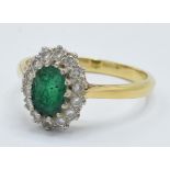 18ct gold emerald and diamond ring, 3.6 grams, size Q.