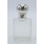 Silver and glass perfume bottle with screw top lid, London 1909, 12cm tall. Displays well with