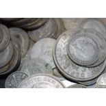 A collection of silver coins to include 18.3 grams of pre-1920 coins and 376.4 grams of 1920-46