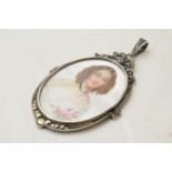 Silver and marcasite mother of pearl miniature pendant with portrait of a lady, 6cm long.