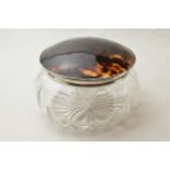 Silver and tortoiseshell topped glass jar, London 1923, 14.5cm diameter. In good condition.