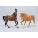 Beswick Spirit of Freedom 2689, in gloss palomino colourway (ears af), together with brown gloss