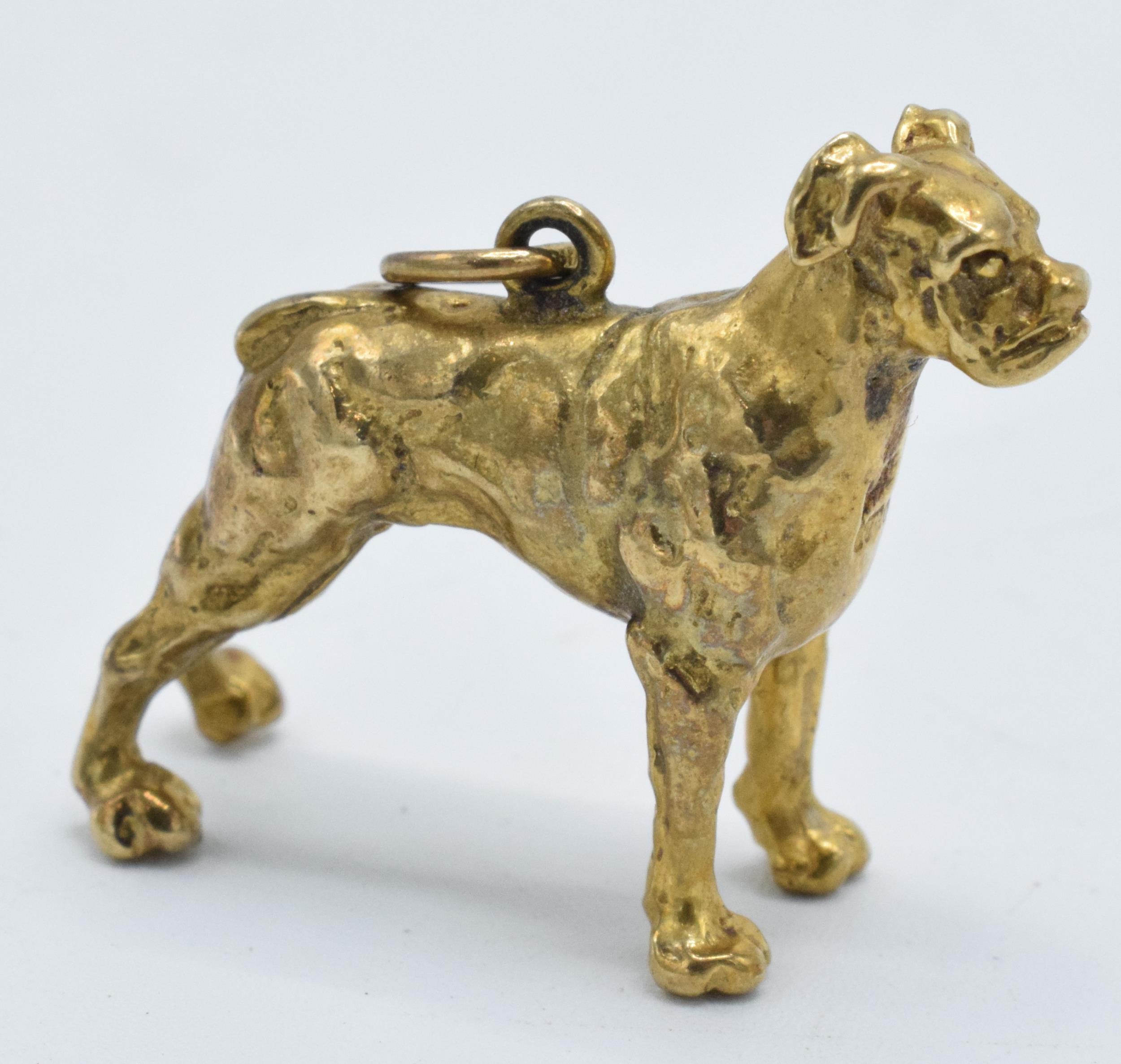 9ct gold charm in the form of a boxer dog, 5.8 grams, 24mm long, hallmarked.