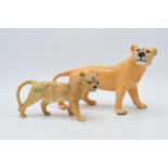 Beswick Lioness 2097 together with lion cub (2).