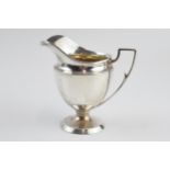 Silver pedestal cream jug, Birmingham 1913, 87.4 grams, 10cm tall.