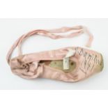 Alexandra Danilova: a 1940s pink ballet pointe shoe, signed by Danilova 'To Cliff A. Danilova 1941',