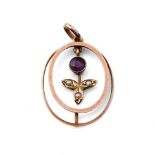 Edwardian 9ct gold pendant set with an amethyst and seed pearls, 1.1 grams, 2.5cm long.
