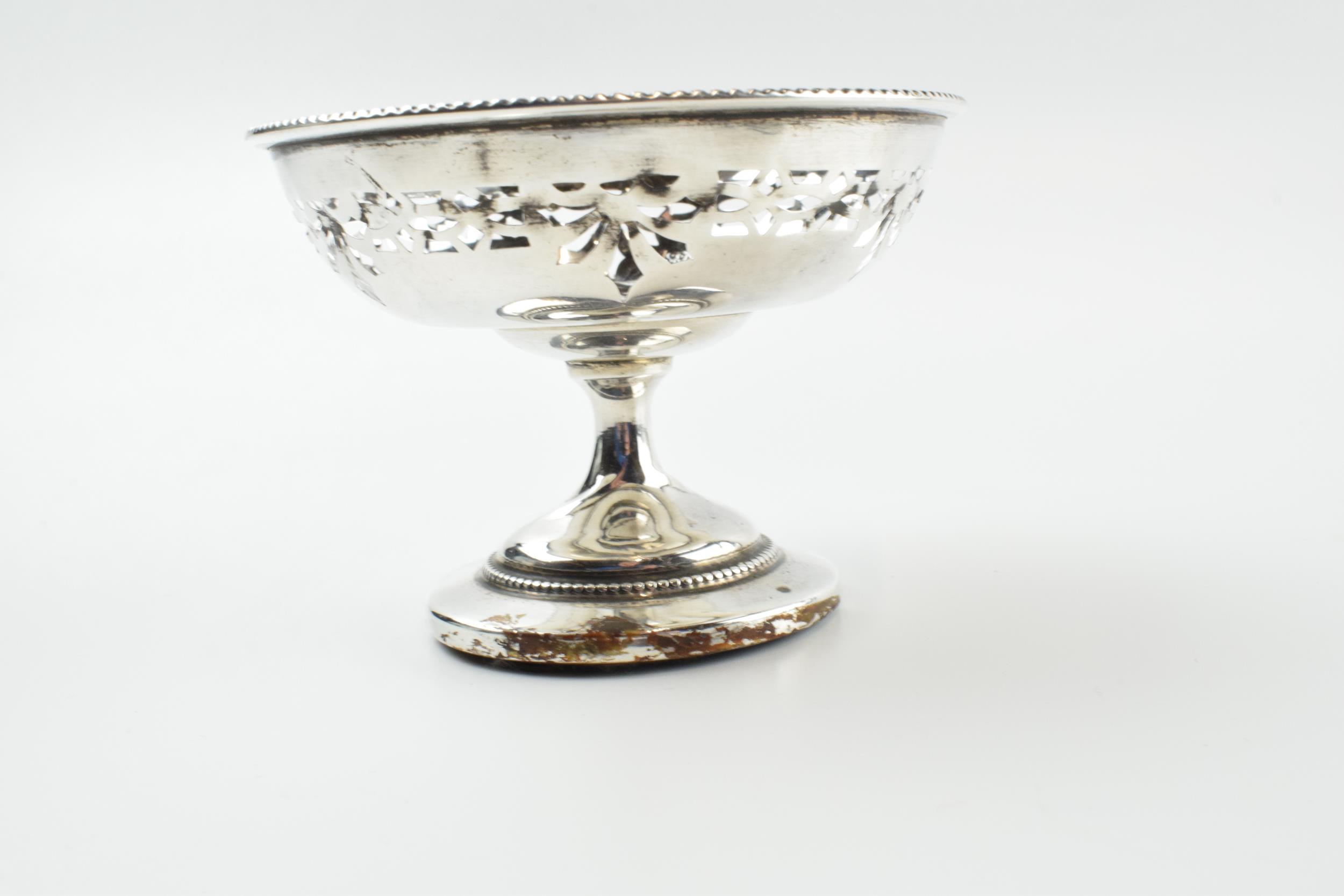 A pair of silver items to include an ornate pedestal sweet dish, Birmingham 1922, loaded base, and a - Image 7 of 8