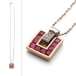 18ct gold and white gold diamond and ruby pendant on 18ct gold chain, designed by Guy Laroche, 5.6