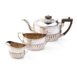 Hallmarked silver tea set to include a teapot, milk and sugar bowl, 388.0 grams / 12.48 oz gross