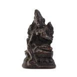 19th century bronze cast oriental figure of a Buddha, 11cm tall. In good condition, some holes to