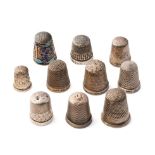 A collection of sterling silver thimbles, one with enamelled decoration, mostly hallmarked, 34.4