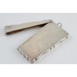 Silver card case with hinged lid with musical notes decoration, Birmingham 1932, 50.4 grams, 9cm