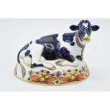 Royal Crown Derby paperweight in the form of a Friesian Cow - Buttercup, with silver stopper. In