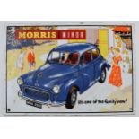 Enamel advertising sign for "Morris Minor" 'It's One of the Family Now', 26x18cm. Reproduction.