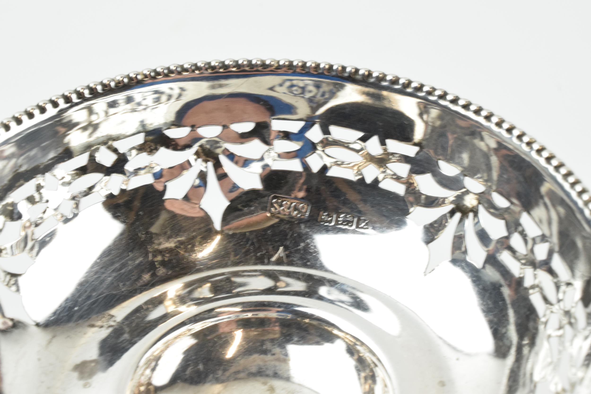 A pair of silver items to include an ornate pedestal sweet dish, Birmingham 1922, loaded base, and a - Image 8 of 8